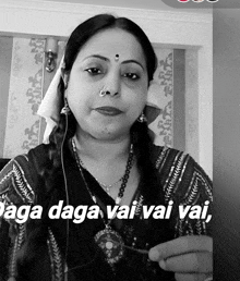 a black and white photo of a woman with the words laga  daga vai vai vai