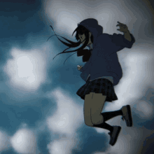 a girl in a plaid skirt and a hoodie is jumping in the air