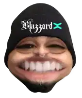 a man wearing a black beanie that says blazzard