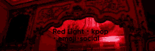 a red light with the words red light kpop emoji social written on it