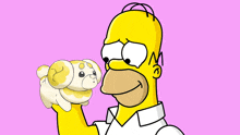 homer simpson holds a stuffed animal in his hand