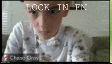 a picture of a boy with the words lock in fn on the bottom