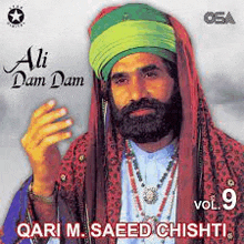 a man with a beard wearing a turban and a necklace is on the cover of a cd .