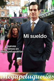 a man in a suit and tie is walking on a pink carpet with a caption in spanish that says mi sueldo