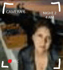 a woman 's face is being recorded by camera 6 and night 2