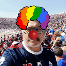 a man wearing a clown wig and a shirt that says robido