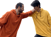 a man in a yellow hoodie holds another man 's arm