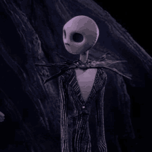 jack skellington from the nightmare before christmas standing in a dark room