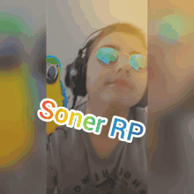 a girl wearing sunglasses and headphones has the name soner rp written on her face