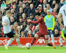 a soccer game is being played with a score of 3-0