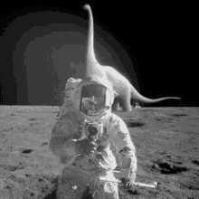 a black and white photo of an astronaut on the moon taking a picture of a dinosaur .