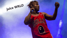 juice wrld is wearing a bulls jersey and singing into a microphone