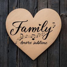 a wooden heart with the words family amore sublime written on it