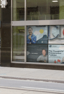 the thoughtful entrepreneur podcast is displayed on a window