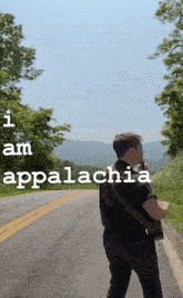 a man standing on the side of a road with the words " i am appalachia " on the bottom