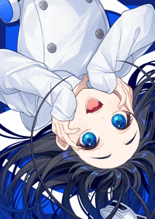 a girl with blue eyes is laying upside down on a blue and white background