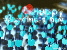 a happy valentine 's day greeting with blue hearts