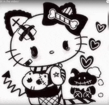 a black and white drawing of hello kitty holding a stuffed animal and a dog .