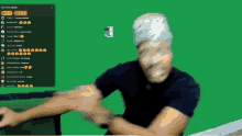 a man 's face is visible in front of a green screen with the words live chat replay at the top of the screen