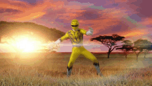 a yellow power ranger is standing in a grassy field