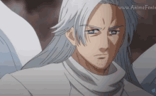 a man with long white hair and blue eyes is on a website called www.animefenix.com