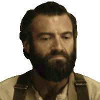 a man with a beard and suspenders is looking at the camera