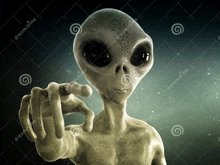 a gray alien pointing at the camera with a watermark that says ' dreamstim ' on it