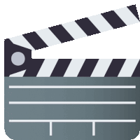 a black and white striped clapper board with a t on the bottom