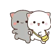 a gray cat and a white cat are standing next to each other and holding a banana .