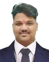 a man with a red circle on his forehead wears a suit and tie