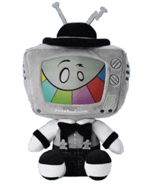 a stuffed toy that looks like a television with a smiley face on it