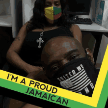 a man and a woman wearing face masks with the words i 'm a proud jamaican on the bottom