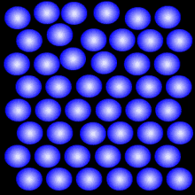 blue circles on a black background with a white center