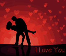 a silhouette of a man holding a woman in his arms with the words i love you below them