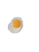 a fried egg on a white background with a yellow yolk