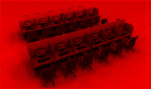 a row of computer cubicles with a red background and a computer on the cubicle that says ' microsoft '