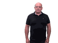 a bald man wearing glasses and a black shirt is standing in front of a white background