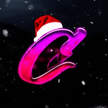 a purple letter c with a santa hat on it