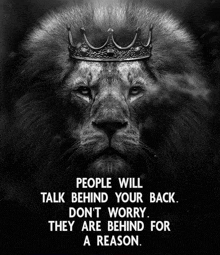 a black and white photo of a lion wearing a crown with a quote below it