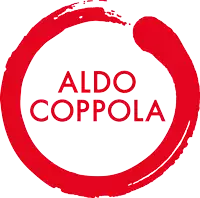 a red circle with the words aldo coppola inside