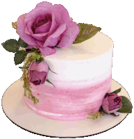 a pink and white cake with flowers on top