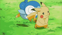 a pikachu standing next to a penguin in a grassy field