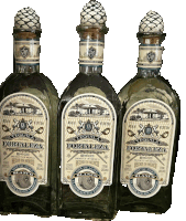 three bottles of tequila fortaleza with white labels