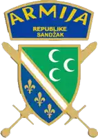 a blue and green emblem with the words armija republike sandzak