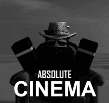 an ad for absolute cinema shows a man in a hat and sunglasses sitting in a chair