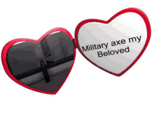 a heart shaped mirror that says military axe my beloved on it