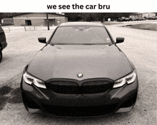 a black and white photo of a bmw with the words we see the car bru above it