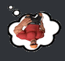 a man in a red shirt is laying on his back with a thought bubble around him .