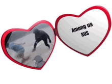 a heart shaped mirror that says among us sus on it