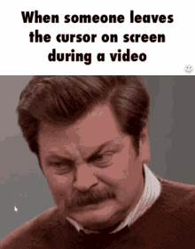 a man with a mustache is making a funny face while someone leaves the cursor on screen during a video